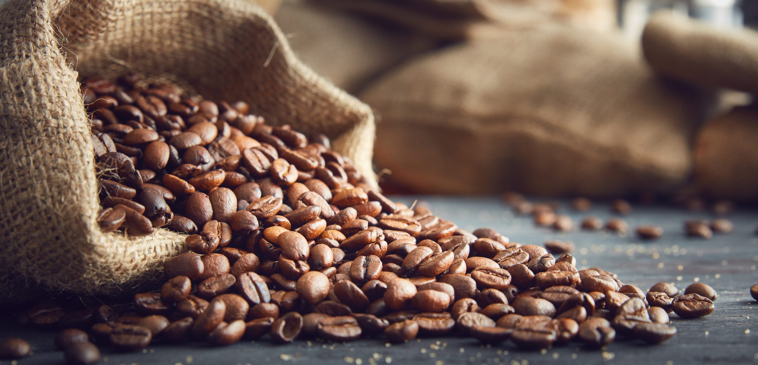 Coffee beans in a burlap bag