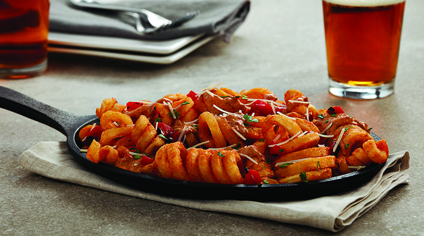 Loaded curly fries with two pints of beer