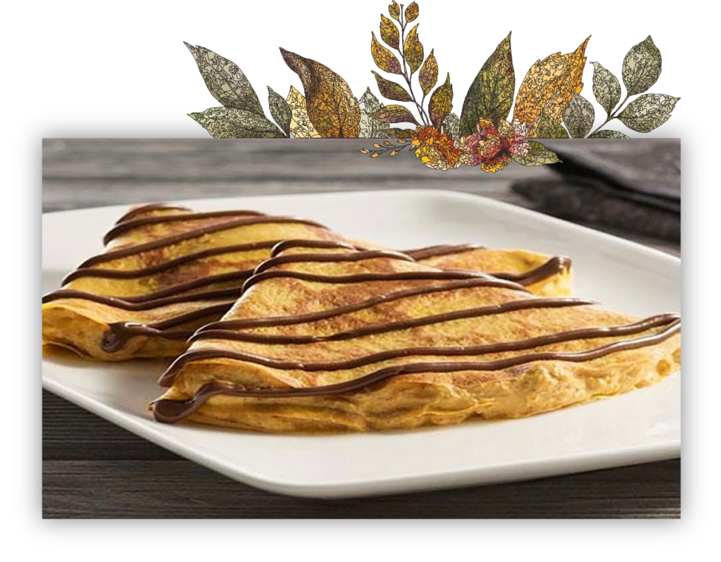 two crepes with chocolate sauce on a white plate