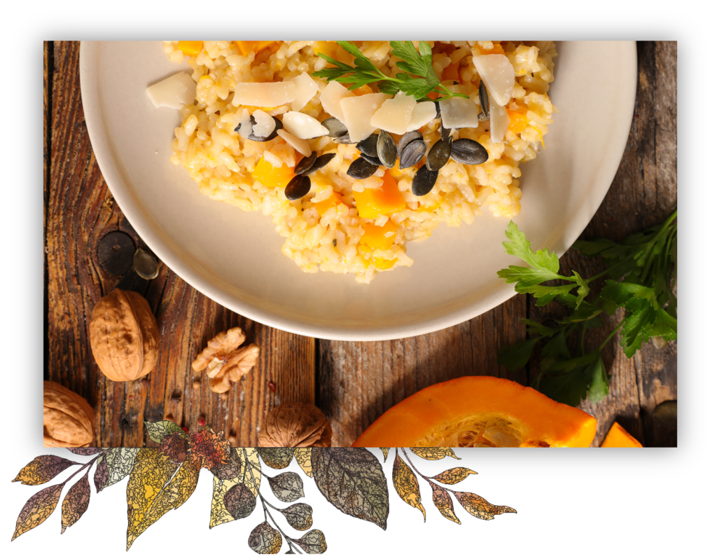 a plate of risotto with pumpkin and seeds on white plate