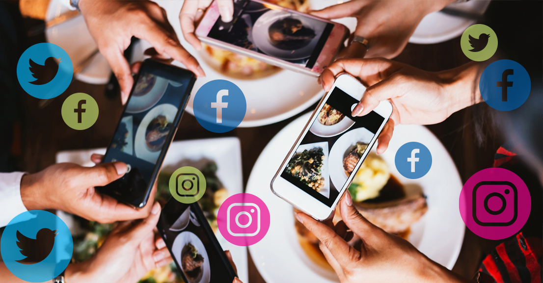a group of people taking pictures of food with their phones, with social media logos overlaying the image