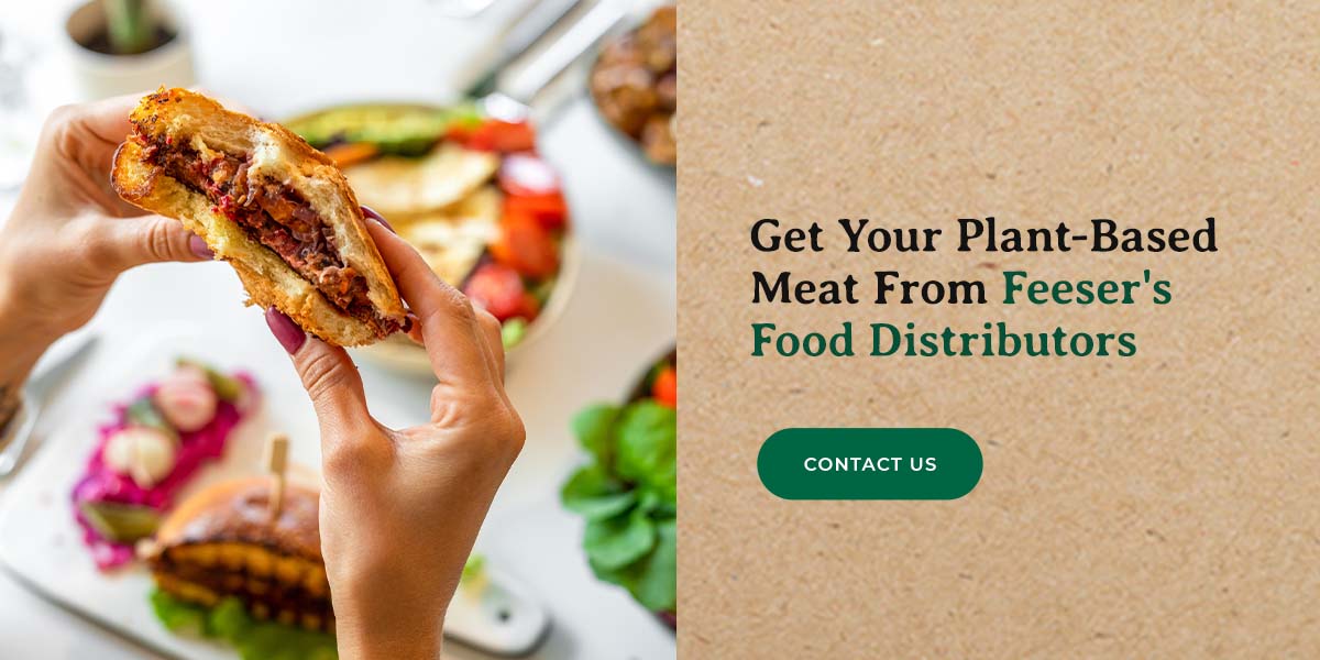 a person is holding a sandwich with the words get your plant-based meat from feeser 's food distributors below it