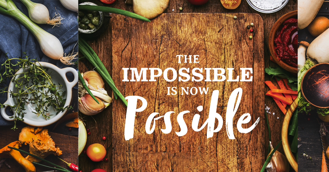 a wooden cutting board with the words "the impossible is now possible" on it