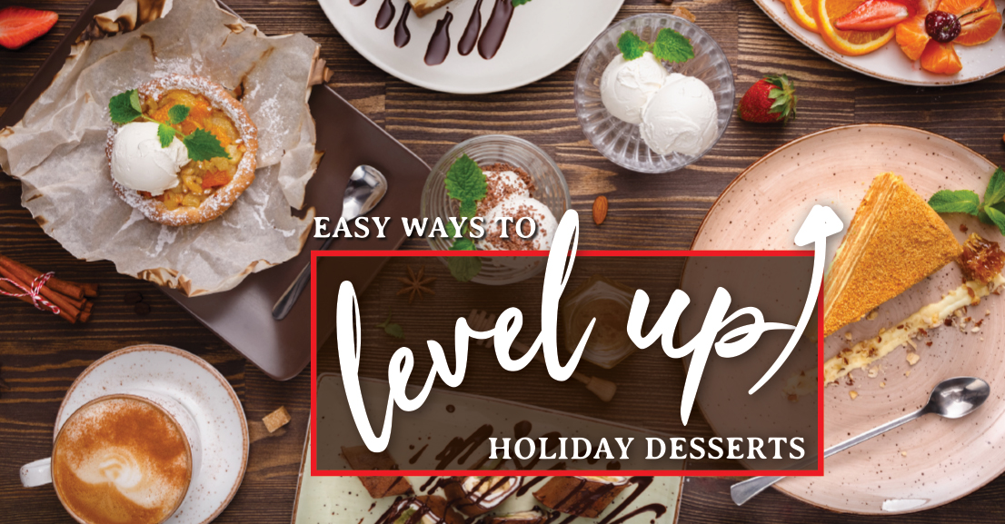 a table topped with plates of desserts including pies, a cup of coffee, and strawberries