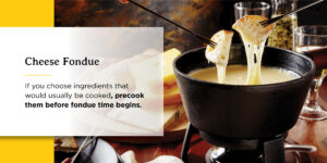 a person is dipping a piece of cheese into a bowl of cheese fondue