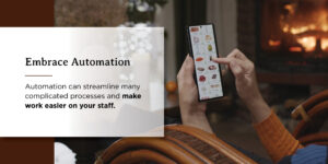 a person is holding a cell phone with embrace automation graphic