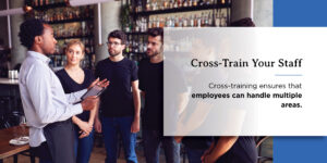 a man is giving cross training restaurant staff