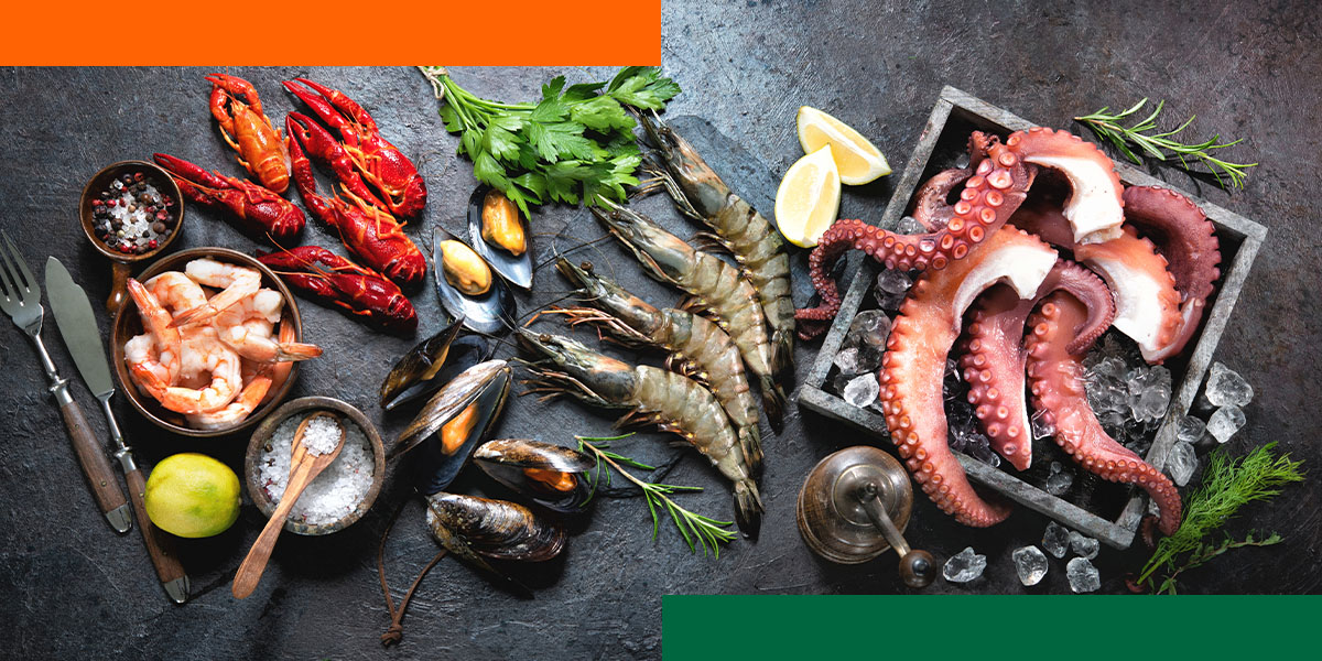 a variety of seafood including shrimp and octopus on ice