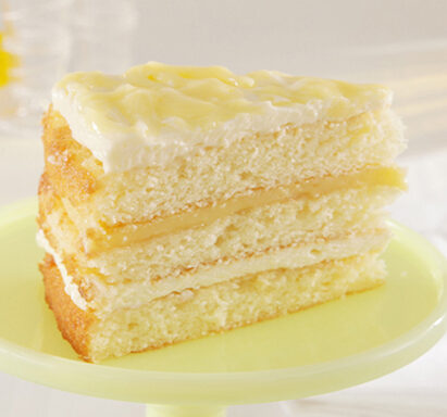 CAKE, LAYER 3 LEMONADE W/ LEMON CURD ICED 9 14 SLICED TFF BOX FROZEN